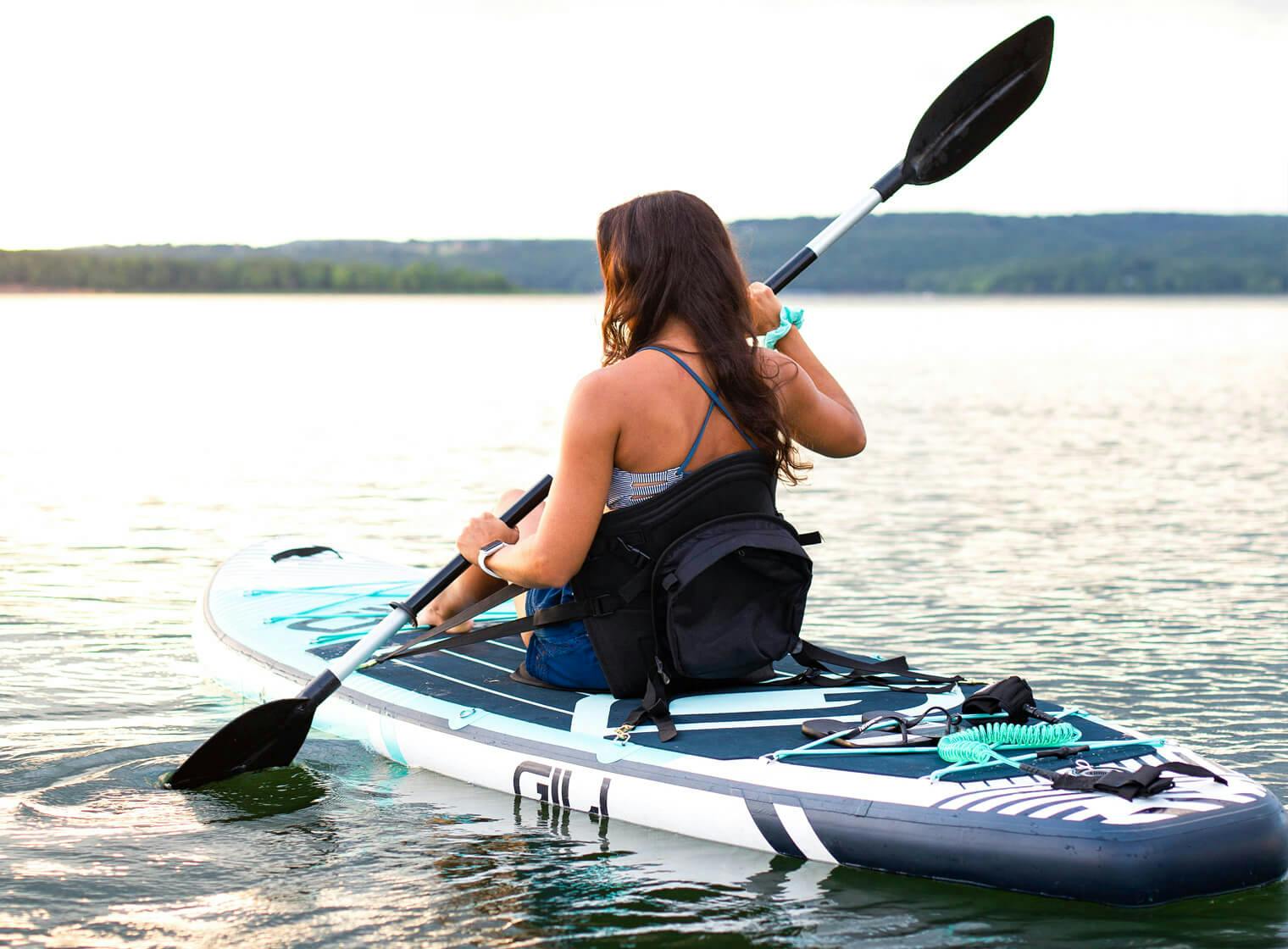 Girl sitting on a kayak with seat